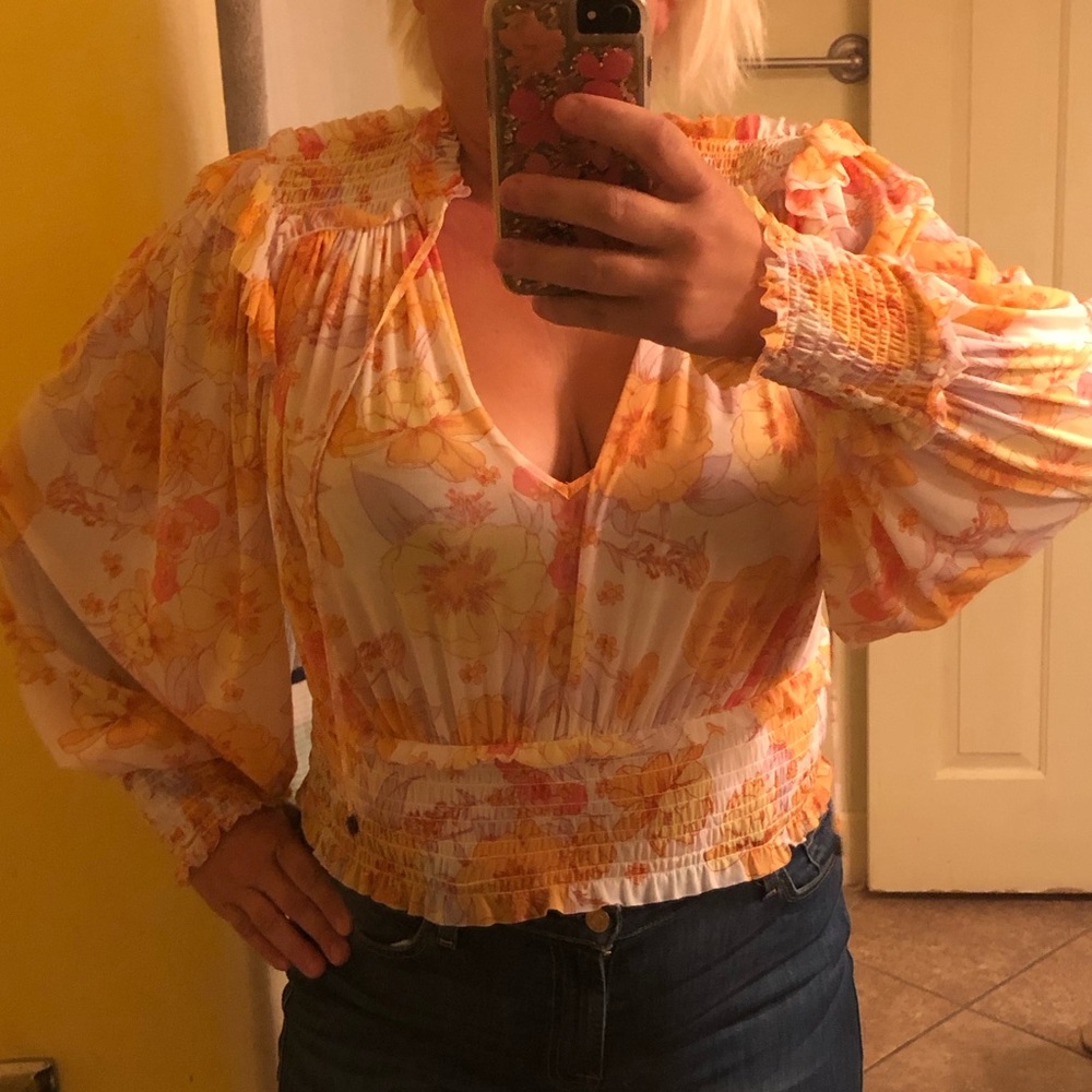 Free People Long Sleeve Blouse with smocked waist; size medium